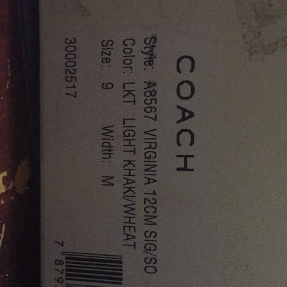 Woman’s Coach Biege & Tan size 9 sandals.